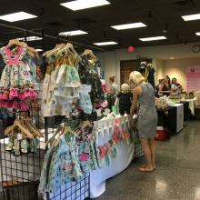 Children's clothing booth at an expo