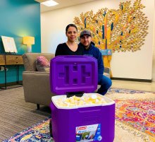Carmen and Jose deliver breastmilk donation.