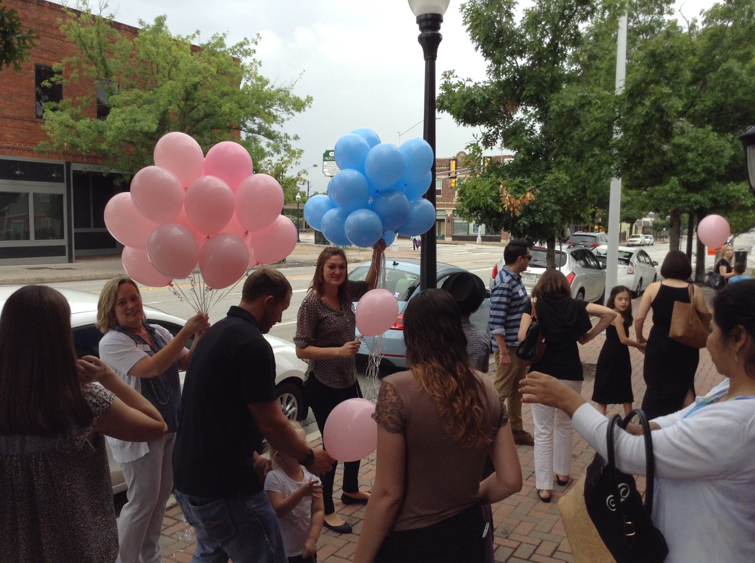 Passing out balloons to event attendees