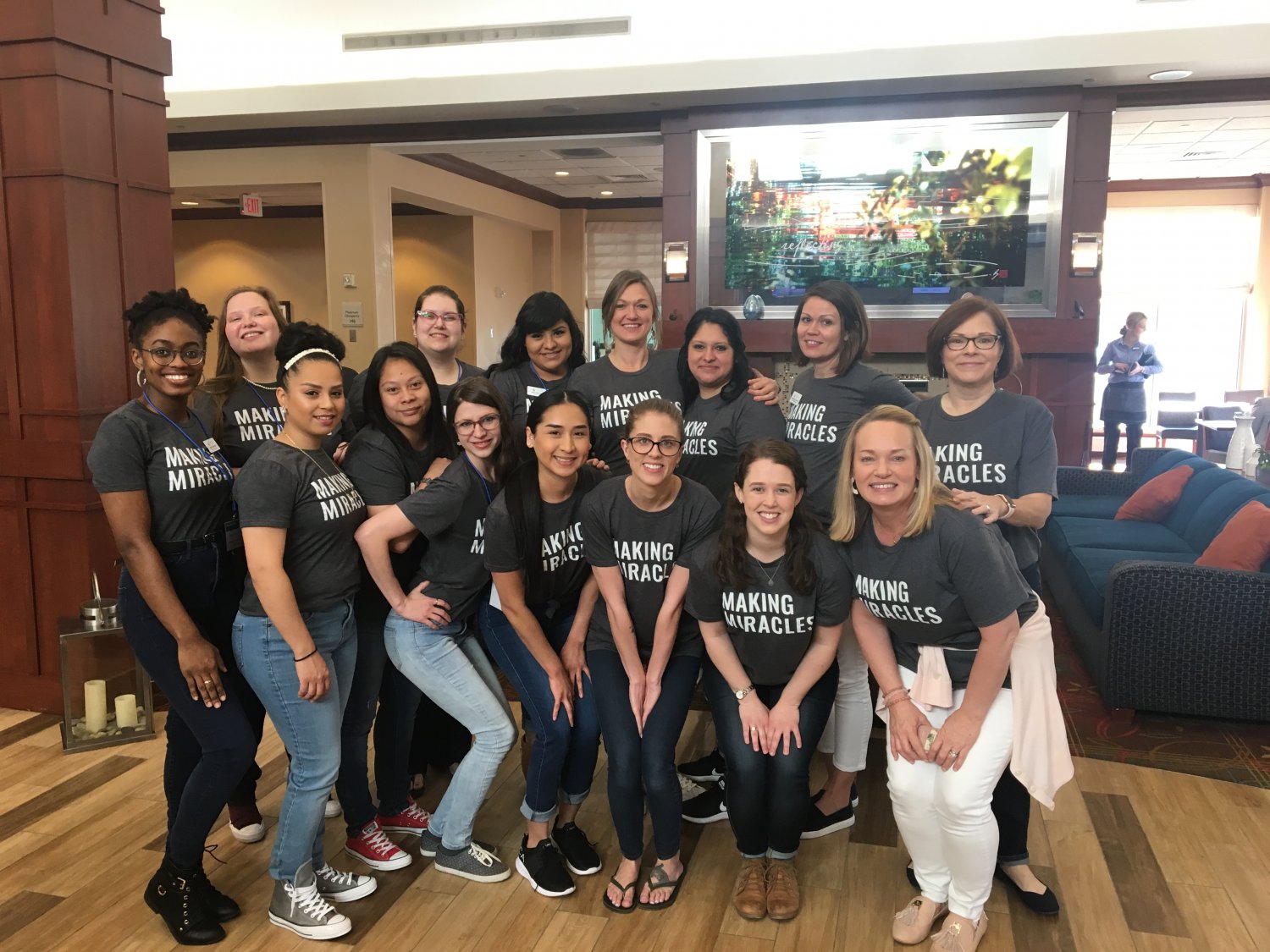Fifteen women in matching t shirts