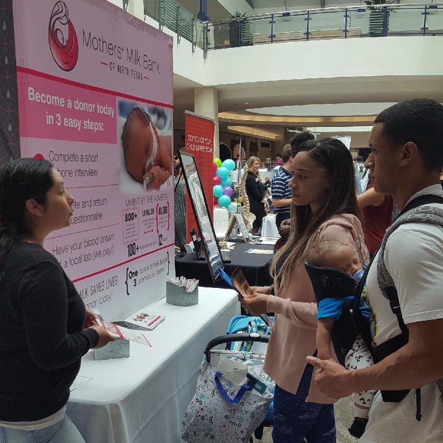 MMBNT staff talks with family