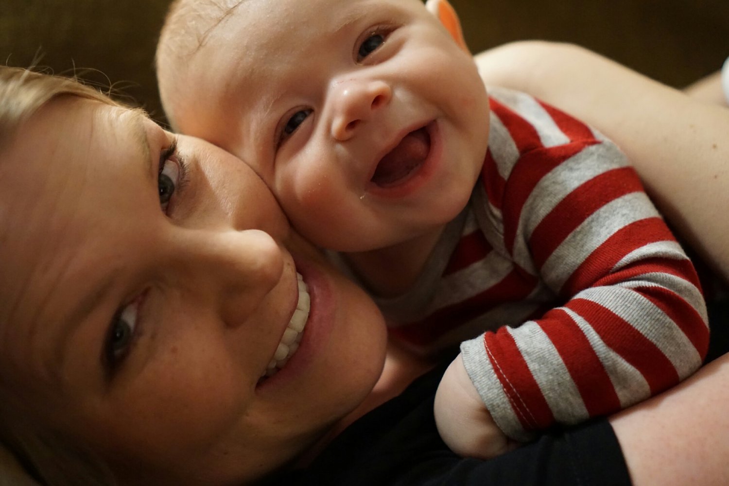 Mother holding infant son